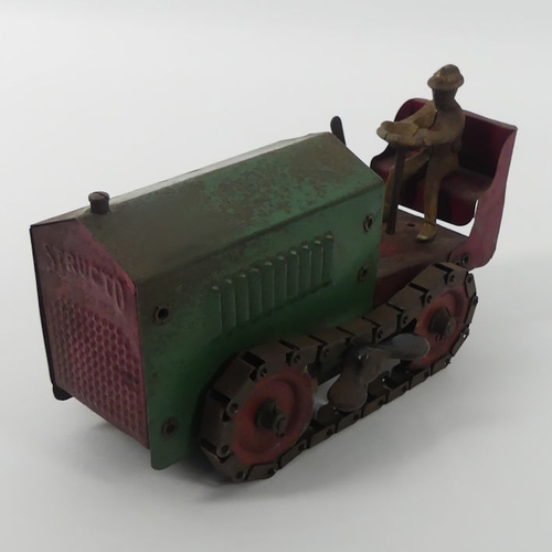 394 - A Structo tin plate clockwork caterpillar tractor, 22cm x 10cm.