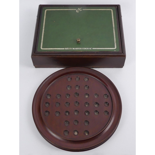 394A - Remy Martin wooden Le Passe Temps game and a 26cm mahogany solitaire board, 28.5cm x 22.5cm x 7cm.