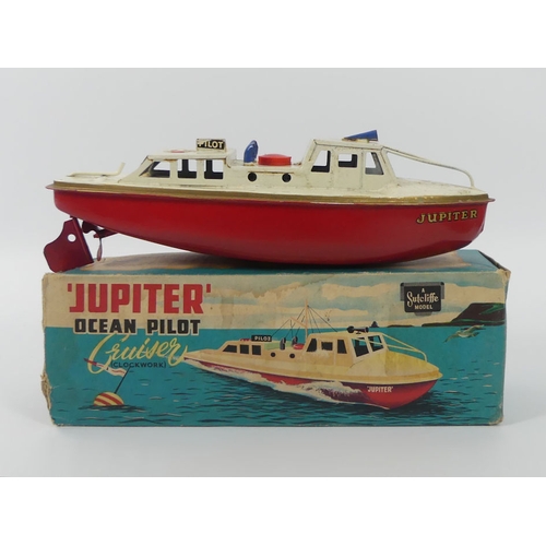 398 - A boxed Sutcliffe Jupiter ocean pilot tin plate clockwork boat, 24cm x 8cm.