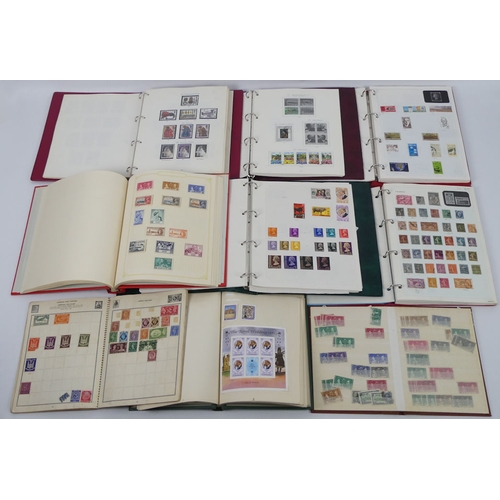 408 - Eight albums of world stamps.