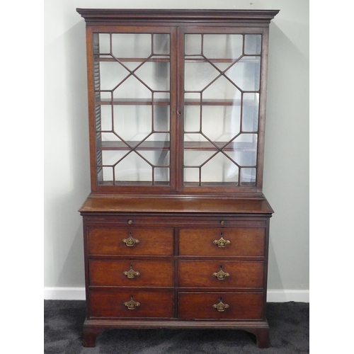 484 - A 19th century mahogany bookcase over a chest of six drawers with brushing slide, 183 cm x 103 cm x ... 