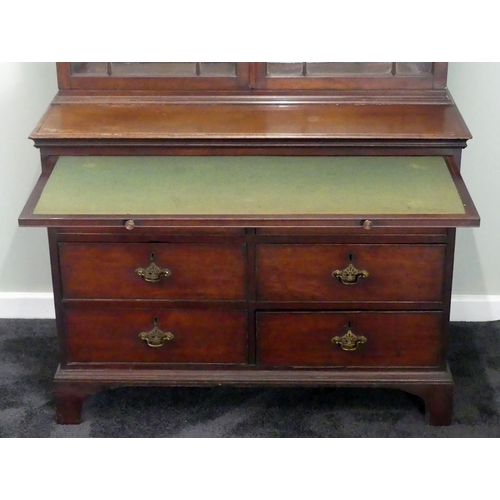 484 - A 19th century mahogany bookcase over a chest of six drawers with brushing slide, 183 cm x 103 cm x ... 