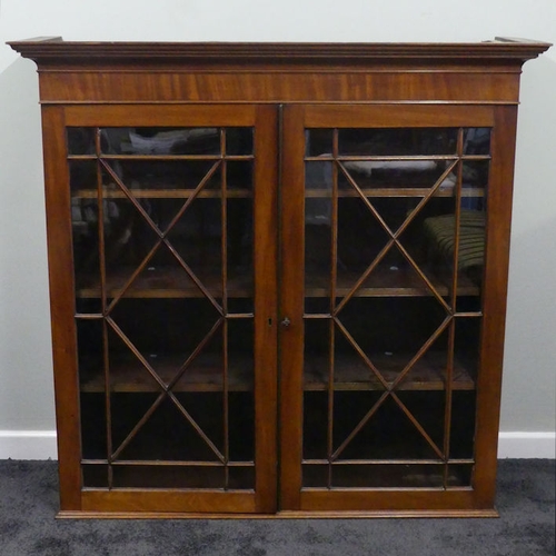 496 - A 19th century mahogany glazed fronted bookcase, 25cm x 122cm x 37cm. Collection own courier only.