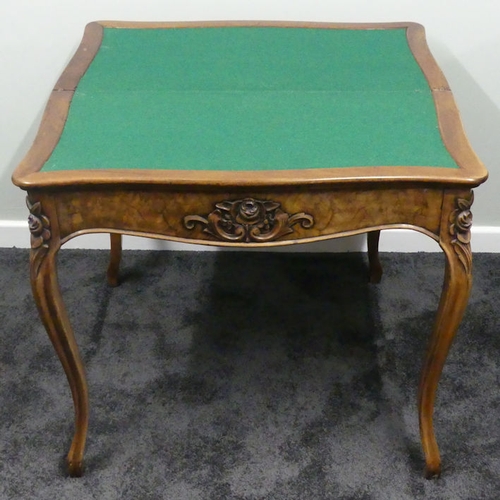 500 - An early 20th century walnut card table, 122cm x 125cm x 37cm. Collection own courier only.