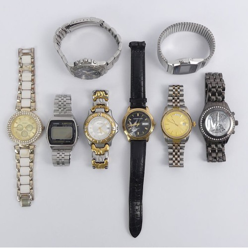 103 - Eight gents watches, including Seiko, Michael Kors and Casio.