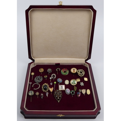 81 - A box of various stick pins, including silver and enamel and a gold a turquoise topped example.