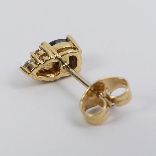 1 - A pair of 18ct gold, sapphire and diamond earrings, 1.7 grams, 8.6mm x 4.4mm.