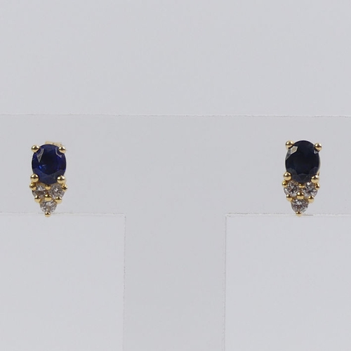 1 - A pair of 18ct gold, sapphire and diamond earrings, 1.7 grams, 8.6mm x 4.4mm.