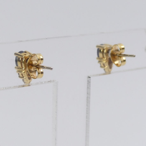 1 - A pair of 18ct gold, sapphire and diamond earrings, 1.7 grams, 8.6mm x 4.4mm.