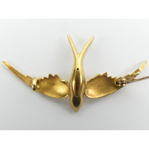 13 - 15ct gold, swallow design brooch, 4 grams, 47mm x 24.6mm.