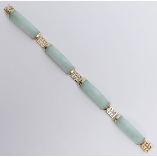 15 - 14ct gold and celadon jade  bracelet, 14 grams, 9.3mm.