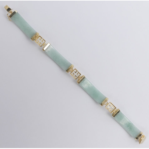 15 - 14ct gold and celadon jade  bracelet, 14 grams, 9.3mm.