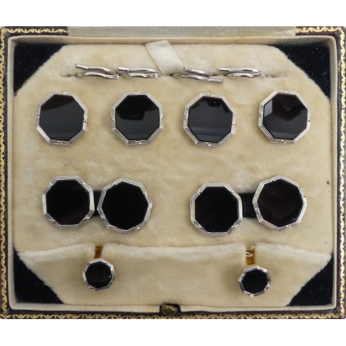 17 - A set of 18ct gold and platinum black onyx cufflinks, buttons and studs in a plush lined fitted box,... 