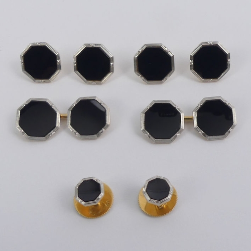 17 - A set of 18ct gold and platinum black onyx cufflinks, buttons and studs in a plush lined fitted box,... 