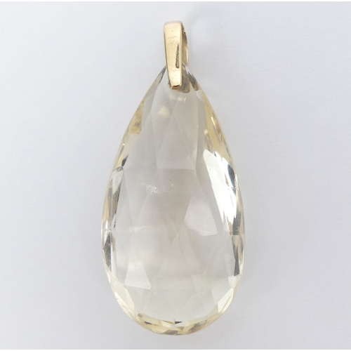 18 - A large gold mounted citrine (approximately 90ct) pear shape pendant, 20 grams, 50 mm x 24mm.