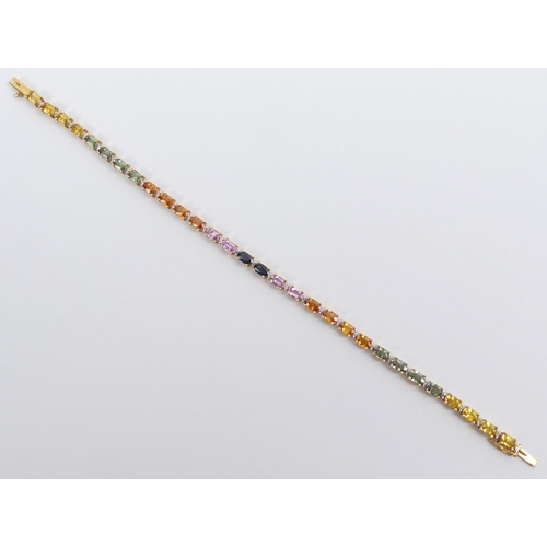 2 - 18ct multi-colour sapphire and diamond line bracelet, 10 grams, 19cm long, 3.85mm wide.