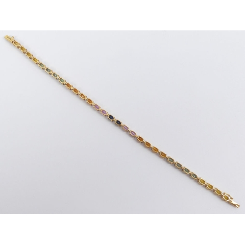 2 - 18ct multi-colour sapphire and diamond line bracelet, 10 grams, 19cm long, 3.85mm wide.