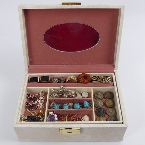 24 - A jewellery box and contents, including a silver cameo locket pendant and chain and a scarab bracele... 