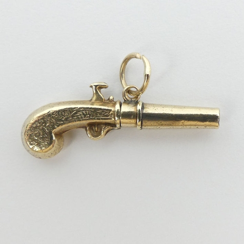 33 - A Victorian gold (un-marked) watch key in the form of a pistol, 2.6 grams, 27.5mm.