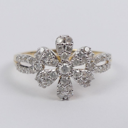 37 - 9ct gold, diamond cluster ring, 2.3 grams, 12.1mm, size P 1/2.