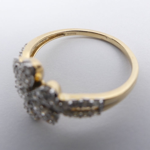 37 - 9ct gold, diamond cluster ring, 2.3 grams, 12.1mm, size P 1/2.