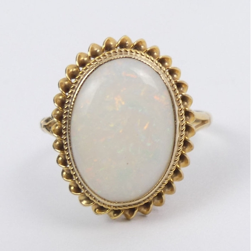 41 - A 9ct opal ring, 2.9 grams, 18.6mm, size M.