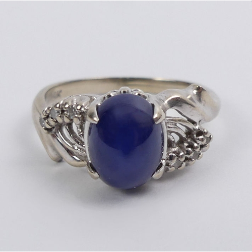 8 - 14ct white gold, star sapphire and diamond ring, 3.9 grams, 9.5mm, size O 1/2.