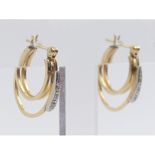 9 - A pair of 14ct gold, diamond earrings, 1.9 grams, 20mm x 15.8mm.