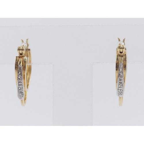 9 - A pair of 14ct gold, diamond earrings, 1.9 grams, 20mm x 15.8mm.