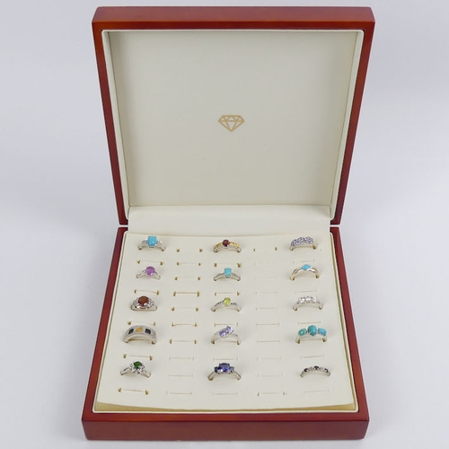 50 - Fifteen sterling silver stone set rings in a fitted case, various sizes and weights.