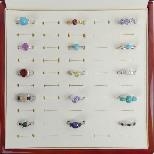 50 - Fifteen sterling silver stone set rings in a fitted case, various sizes and weights.