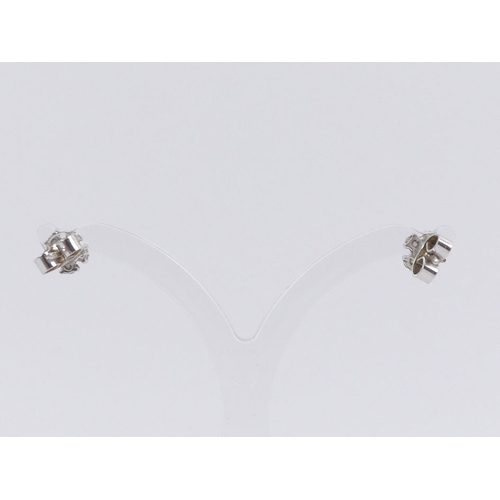 50A - A pair of 9ct white gold, diamond cluster earrings, 1.1 grams, 6.2mm.