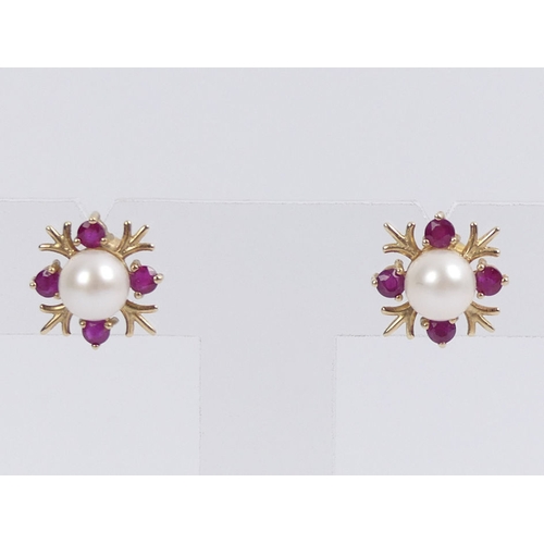 50B - A pair of 9ct gold, cultured pearl and ruby earrings, 2.1 grams, 12.8mm.