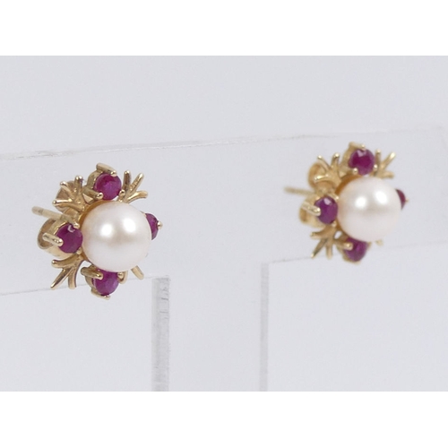 50B - A pair of 9ct gold, cultured pearl and ruby earrings, 2.1 grams, 12.8mm.