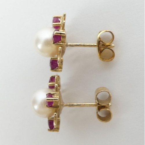 50B - A pair of 9ct gold, cultured pearl and ruby earrings, 2.1 grams, 12.8mm.