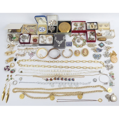 50C - A box of mixed costume jewellery, including a chunky silver gate bracelet.