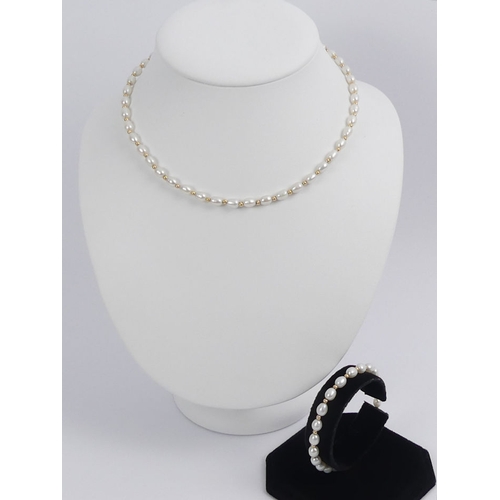 50E - 9ct gold and cultured pearl necklace and bracelet, 17 grams, 40cm x 18.5cm.