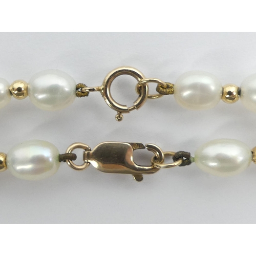 50E - 9ct gold and cultured pearl necklace and bracelet, 17 grams, 40cm x 18.5cm.