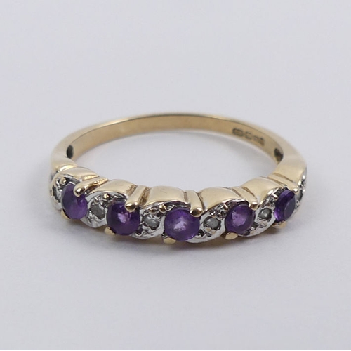 52 - 9ct gold, amethyst and diamond ring, 1.9 grams, 3.65mm, size M.