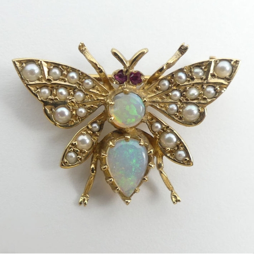 55 - 9ct opal, ruby and seed pearl butterfly brooch, 3.4 grams, 27mm x 19.5mm.