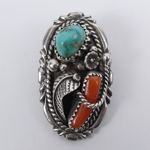 10 - Native American silver (tested), coral and turquoise brooch/pendant, 19.5 grams, 44mm x 26mm.