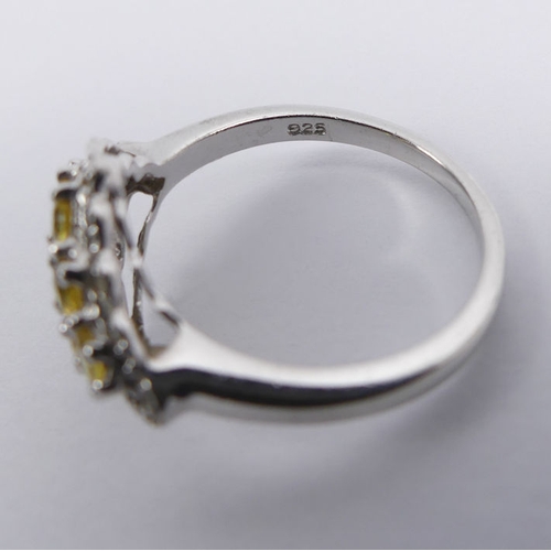 10E - Sterling silver, yellow sapphire and diamond ring, 2.8 grams, 12.8mm, size N1/2.