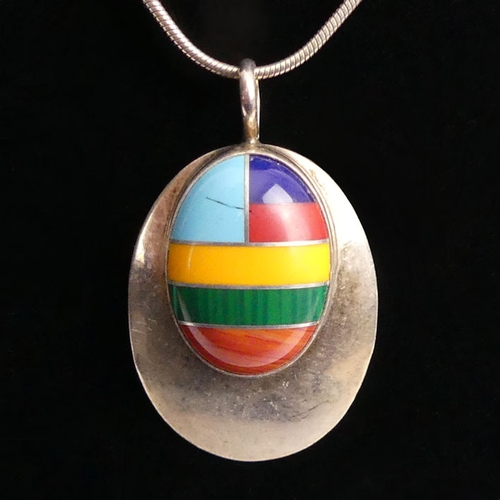 17 - Native American multi-coloured, stone set pendant and chain, signed RW, 7.6 grams, pendant 35mm x 21... 