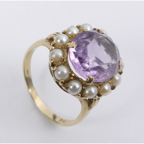 33 - 9ct gold, amethyst and seed pearl ring, London 1965, 4.4 grams, 17mm, size M 1/2.