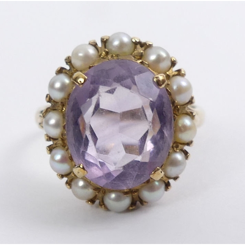 33 - 9ct gold, amethyst and seed pearl ring, London 1965, 4.4 grams, 17mm, size M 1/2.