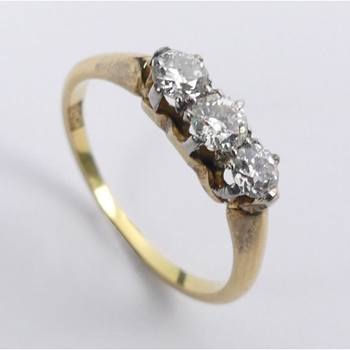 35 - 18ct gold, three stone diamond ring, approximately .25ct total, 2.8 grams, 4.7mm, size O 1/2.