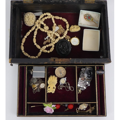 37 - A jewellery box and contents, including a silver St. Christopher pendant and Victorian brooches.