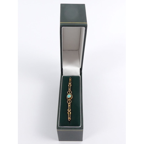 40A - 14ct/15ct gold (tested) bar brooch set with turquoise, 3.8 grams, 69mm.