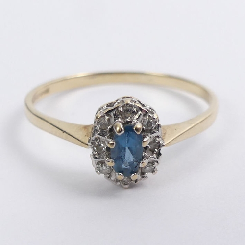 41 - 9ct gold, blue topaz and diamond ring, 1.4 grams, 8.3mm, size R.