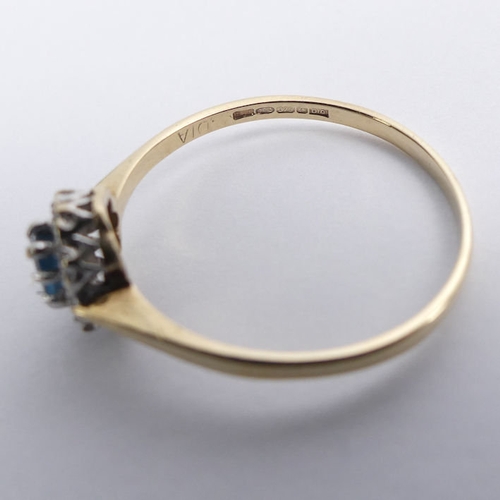 41 - 9ct gold, blue topaz and diamond ring, 1.4 grams, 8.3mm, size R.